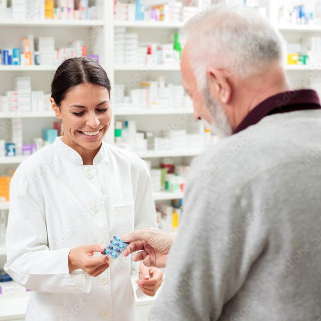 A pharmacist talking to a patient